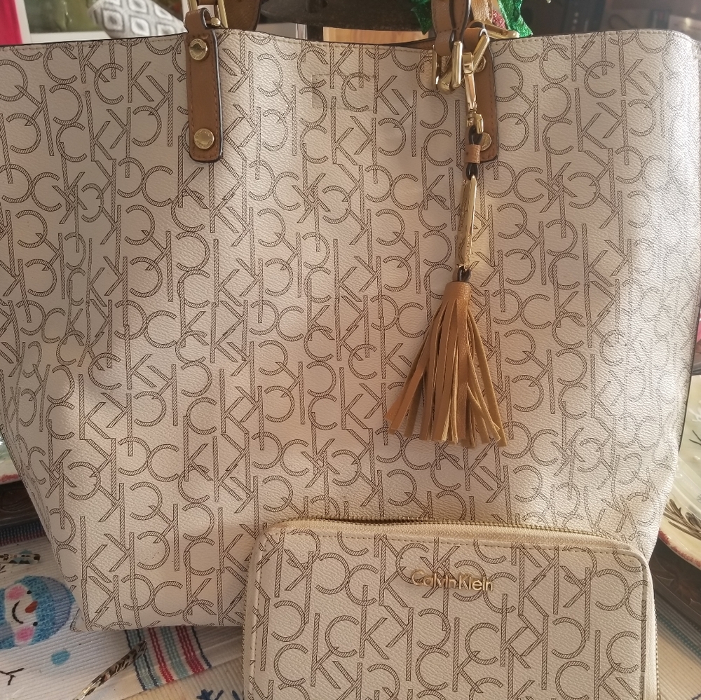 Calvin Klein tote bag with a little bag hooked in